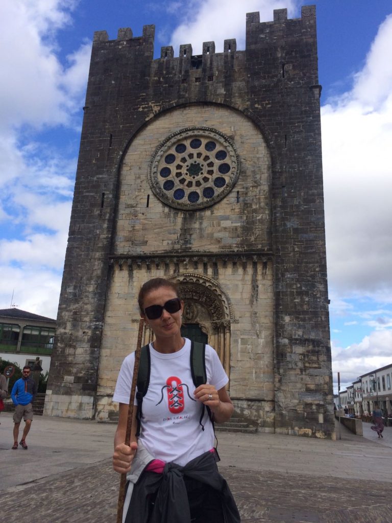 taking a picture in front of the fortress church of portome